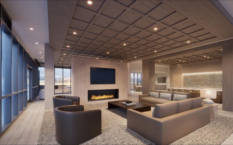 a lounge room with seating and a fireplace