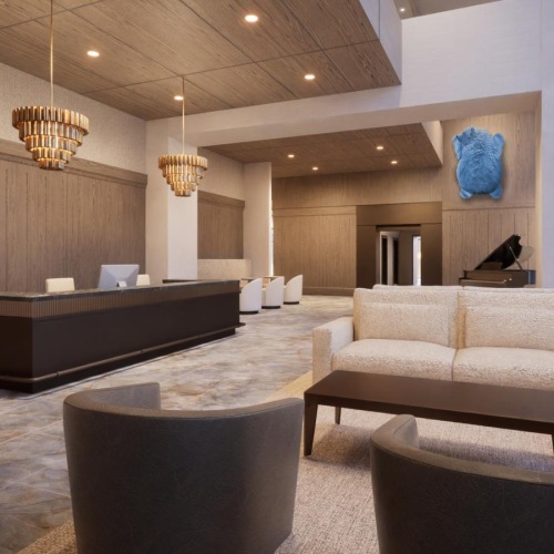 a lounge room with a couch and a table