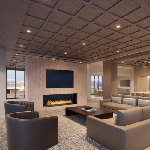 a lounge room with seating and a fireplace